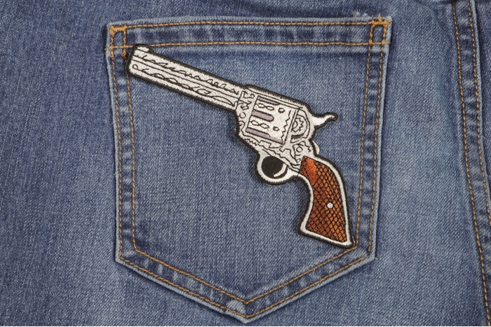 6 Shooter Pistol Patch Left Patch shown on jeans