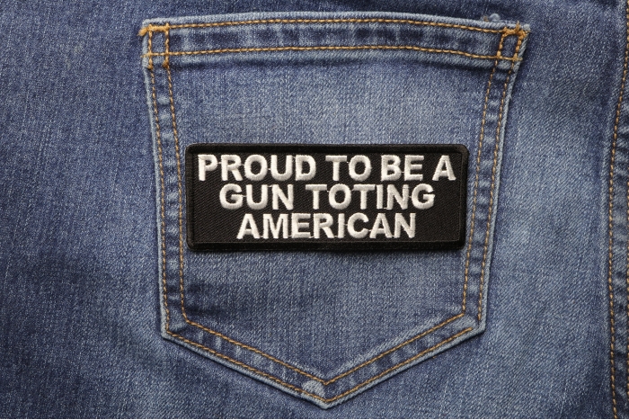 Proud To Be A Gun Toting American Patch shown on jeans