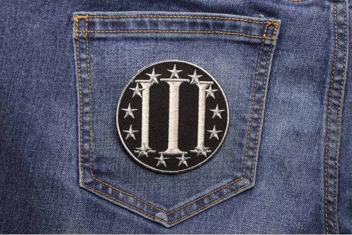 Three Percenter Patch shown on jeans