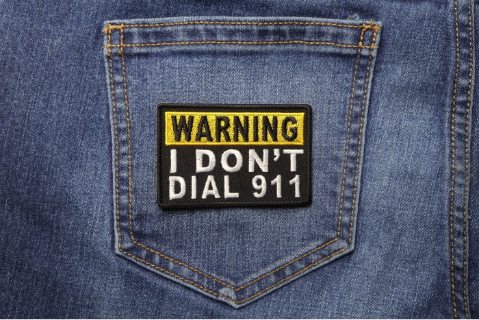 Warning I Don't Dial 911 Patch shown on jeans