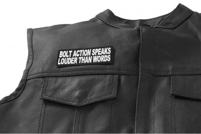 Bolt Action Speaks Louder Than Words Patch - 4x1.5 inch. Embroidered Iron on Patch shown on leather vest