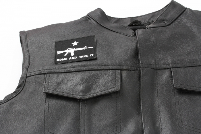 Come and Take It Star Machine Gun Patch - 3x2.5 inch. Embroidered Iron on Patch shown on leather vest