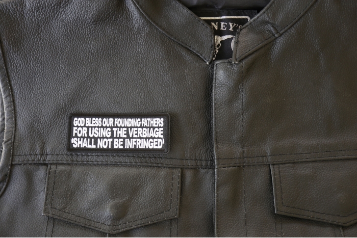 God Bless Our Founding Fathers for Using The Verbiage Shall Not Be Infringed Patch - 4x1.5 inch. Embroidered Iron on Patch shown on leather vest