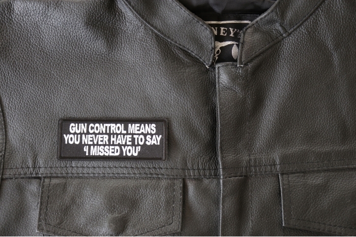 Gun Control Means you never Have to Say I Missed Patch - 4x1.5 inch - Embroidered Iron on Patch shown on leather vest