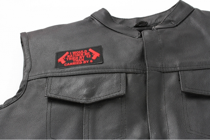 I Would Rather Be Tried By 12 Than Carried By 6 Patch In Red - 3.25x1.75 inch. Embroidered Iron on Patch shown on leather vest