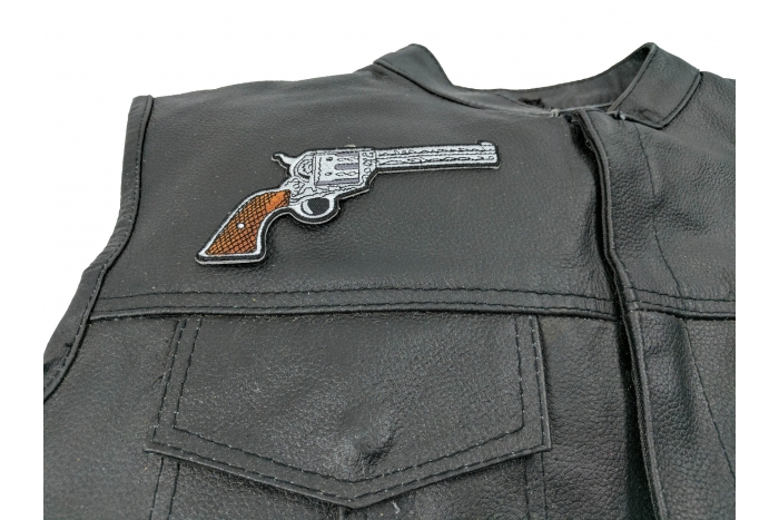 6 Shooter Pistol Gun Patch Right - 5x2.5 inch. Embroidered Iron on Patch shown on leather vest