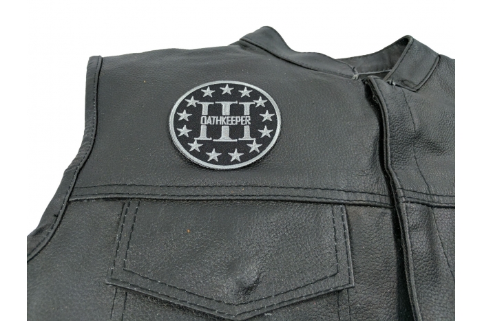 Three Percenter Oathkeeper Round Patch Gray - 3x3 inch. Embroidered Iron on Patch shown on leather vest