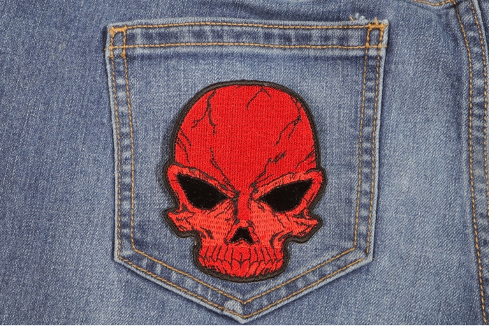 Small Cracked Skull Patch Red shown on jeans