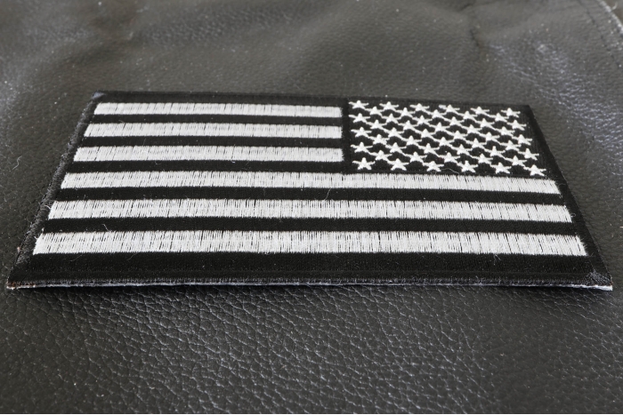 Black and White American Flag REVERSED Patch with Black Borders Black and White American Flag REVERSED Patch with Black Borders diagonal view