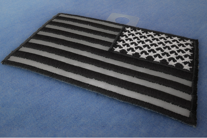 Reflective American Flag Patch Reversed 4 inch Wide diagonal view