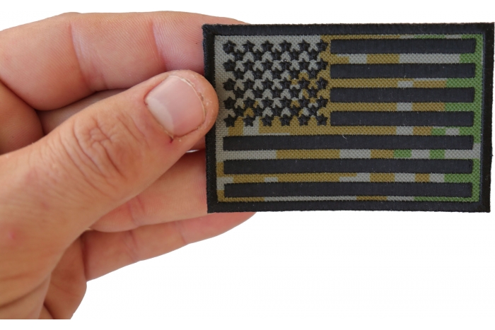 American Flag Camo Patch shown on hand for size comparison
