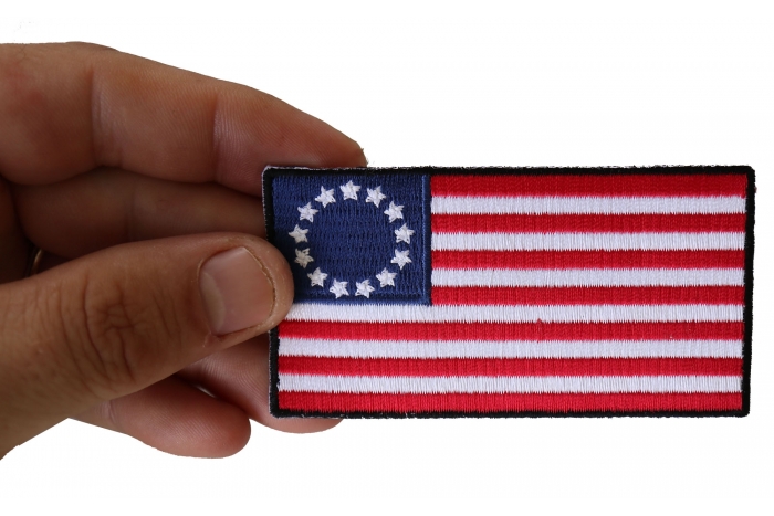 Betsy Ross American Flag Patch shown on hand for size comparison