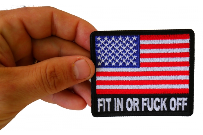 Fit In or Fuck Off USA Flag Patch shown on hand for size comparison