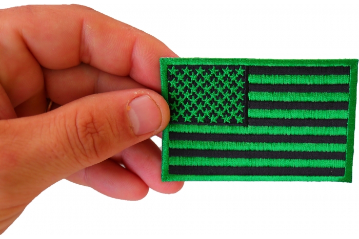 Kelly Green American Flag Patch shown on hand for size comparison