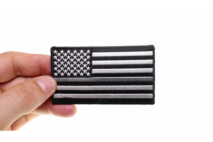 Thin Silver Line American Flag For Corrections shown on hand for size comparison