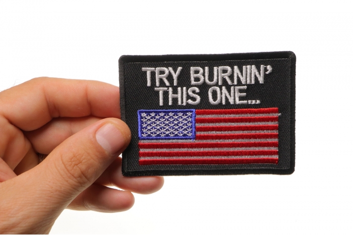 Try Burning This One US Flag Patch shown on hand for size comparison