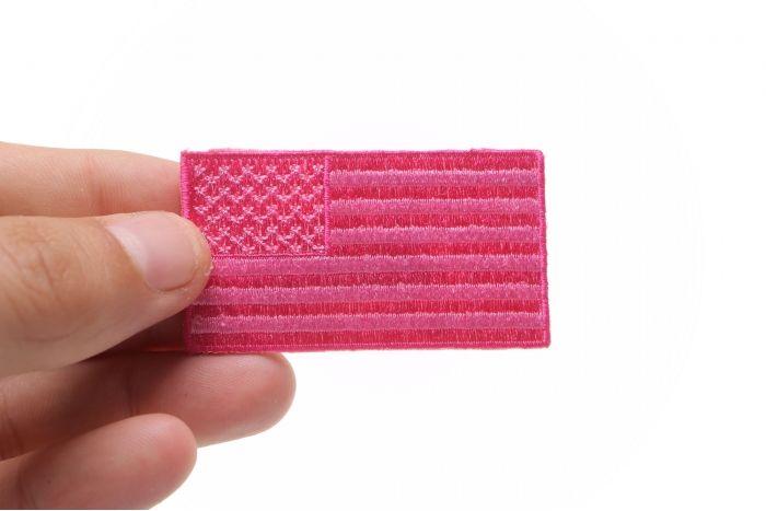 US Flag Patch Pink 2.5 Inch shown on hand for size comparison