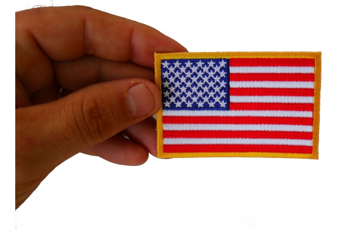 US Flag Patch Small Yellow Border 3 Inch shown on hand for size comparison