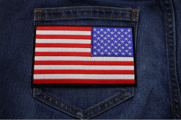 American REVERSED Flag Patch with Black Borders shown on jeans
