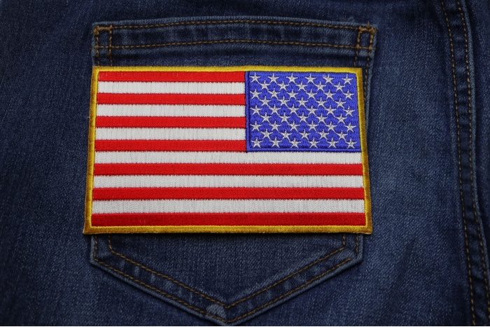 American REVERSED Flag Patch with Yellow Borders shown on jeans