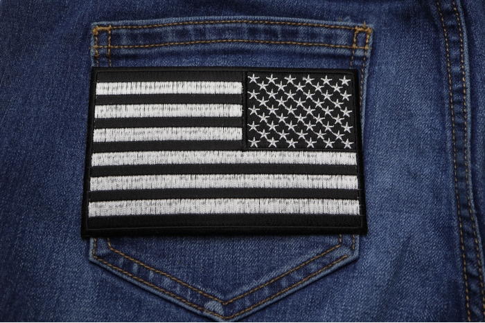 Black and White American Flag REVERSED Patch with Black Borders shown on jeans