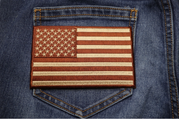 Brown Subdued American Flag Patch shown on jeans