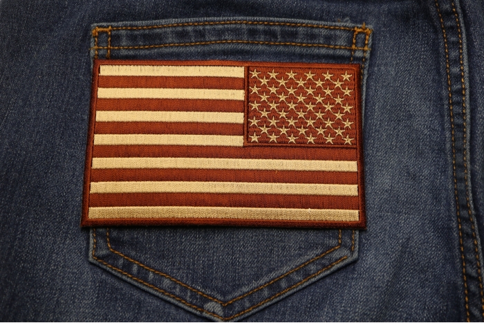 Brown Subdued American REVERSED Flag Patch shown on jeans