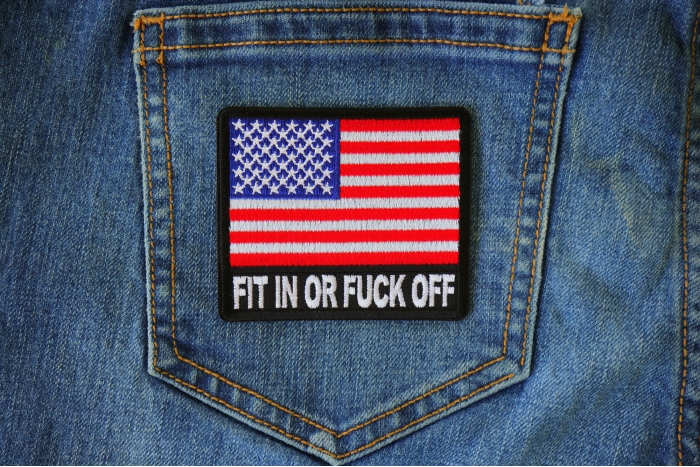 Fit In or Fuck Off USA Flag Patch shown on jeans