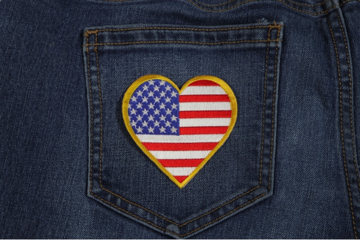 Gold Border Love US Flag Heart Patch shown on jeans