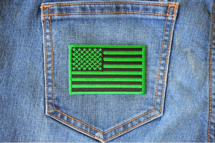 Kelly Green American Flag Patch shown on jeans