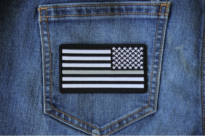 Reversed Silver Line Corrections Officer American Flag Patch shown on jeans