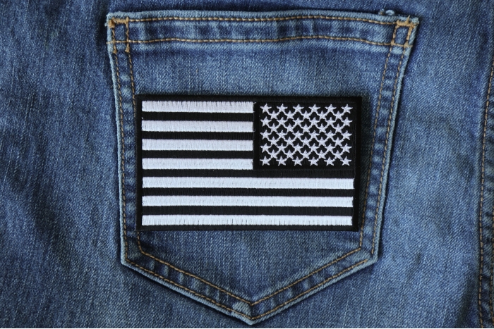 Reversed US Flag Black White Patch 4 Inch shown on jeans