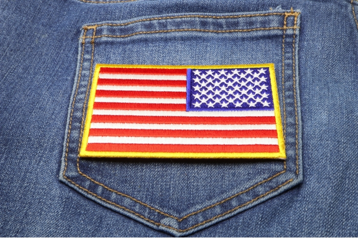 Reversed US Flag Patch 4 Inch Yellow Border shown on jeans