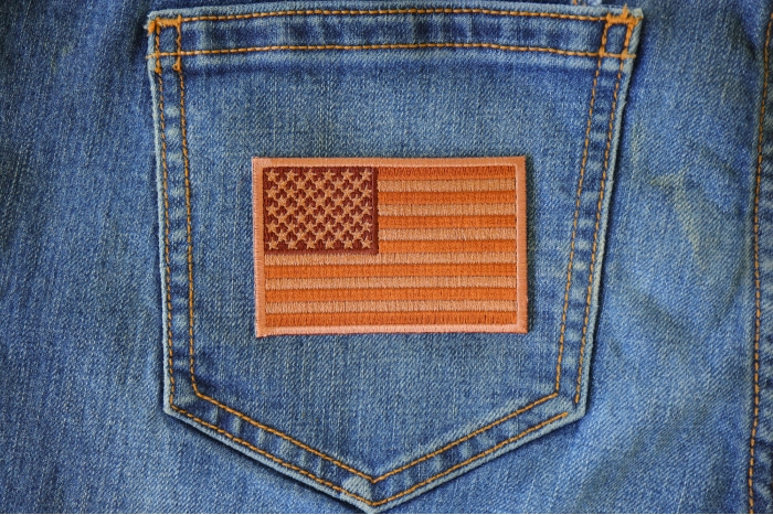 Subdued Brown US Flag Patch shown on jeans