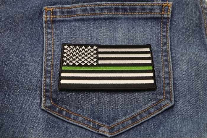 Subdued Green Stripe American Flag Patch shown on jeans
