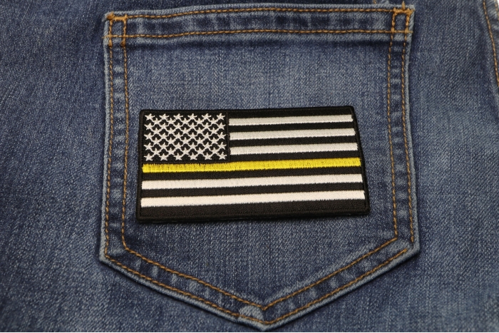 Subdued Yellow Stripe American Flag Patch shown on jeans