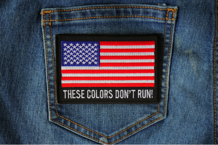 These Colors Don't Run US Flag Patch shown on jeans