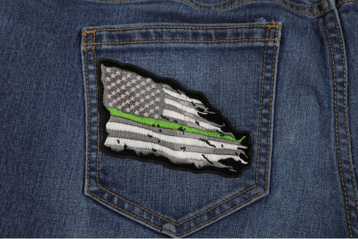 Thin Green Line American Tattered Flag Patch shown on jeans