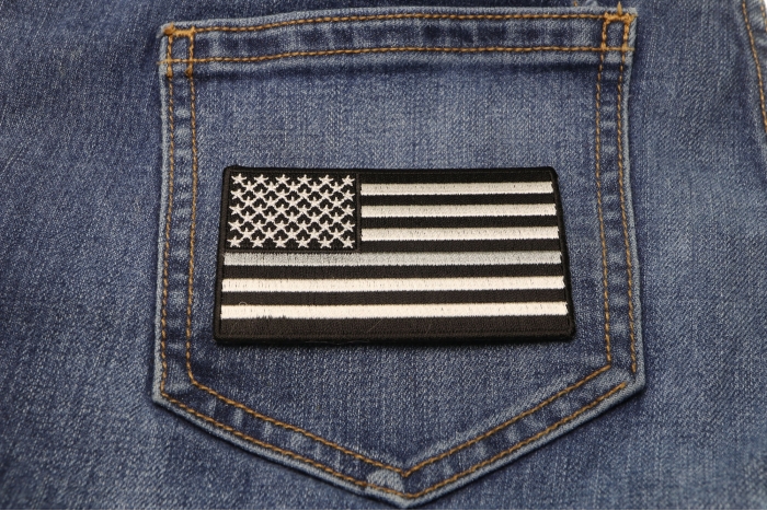 Thin Silver Line American Flag For Corrections shown on jeans