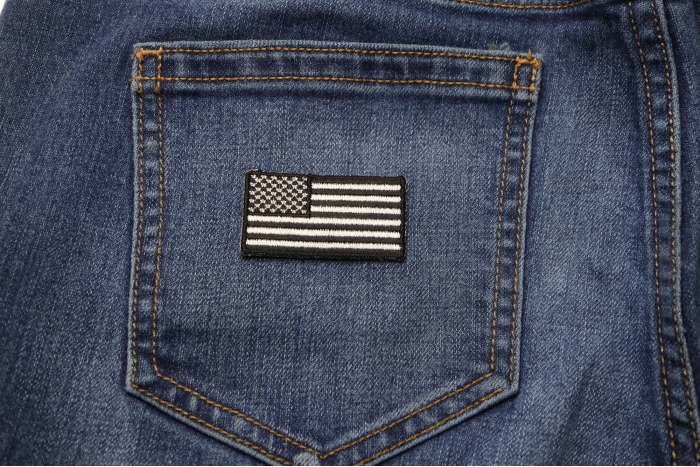 US Flag Patch Black and White 2 Inch shown on jeans