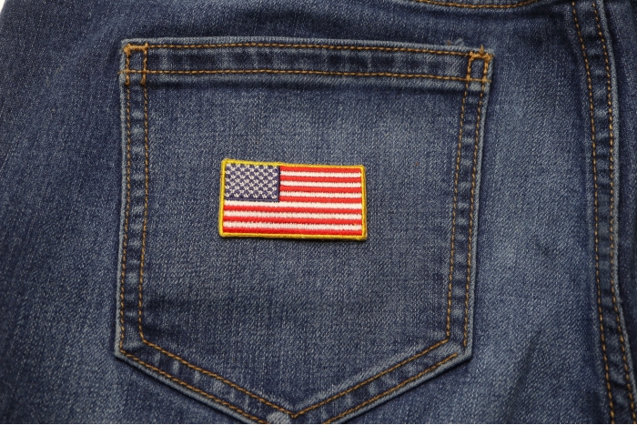 US Flag Patch Gold Border 2 Inch shown on jeans