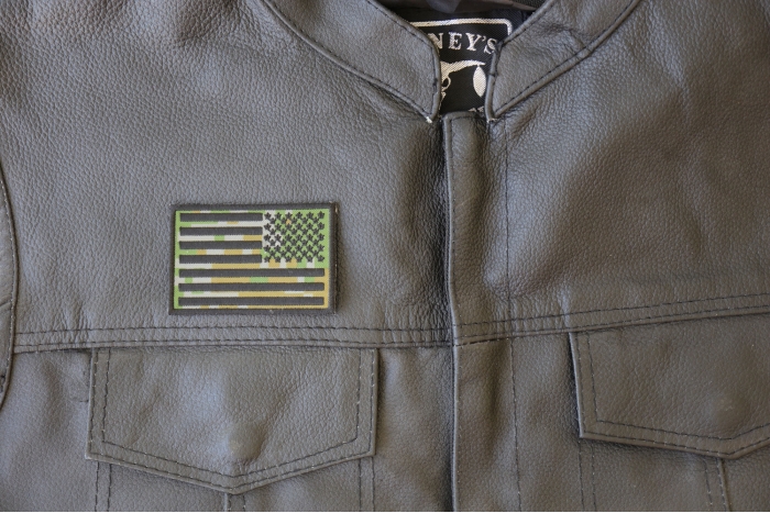 American Flag Reversed Camo Patch - 3x2 inch - Embroidered Iron on Patch shown on leather vest