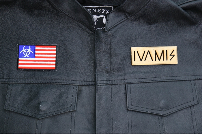 Biohazard US Flag Patch shown on leather vest