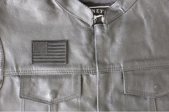 Black American Flag Patch - 3x2 inch - Embroidered Iron on Patch shown on leather vest
