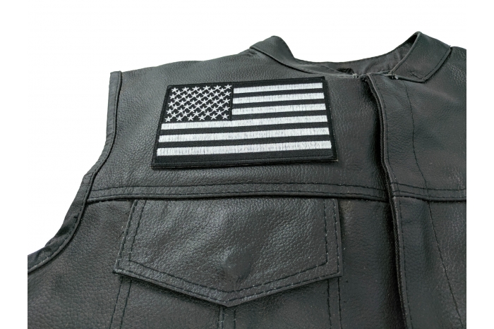 Black and White American Flag Patch with Black Borders - 5x3 inch. Embroidered Iron on Patch shown on leather vest