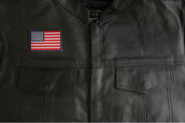 Blue Border American Flag Patch shown on leather vest