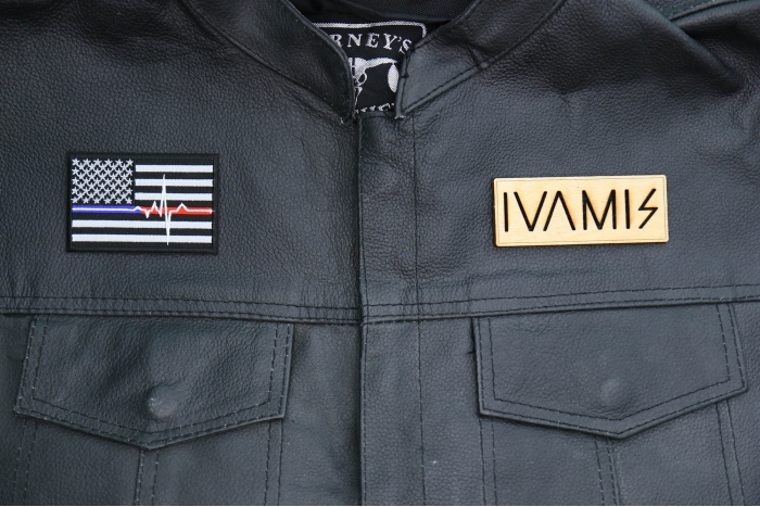 EMT American Flag Patch shown on leather vest