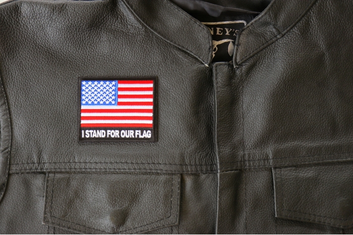 I Stand for Our Flag Patch - 3x2.75 inch. Embroidered Iron on Patch shown on leather vest