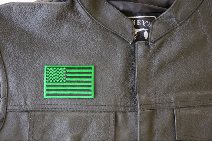 Kelly Green American Flag Patch - 3x2 inch. Embroidered Iron on Patch shown on leather vest