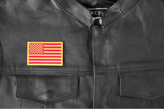Red and Yellow US Flag Patch - 3x2 inch - Embroidered Iron on Patch shown on leather vest